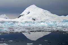 07B Mount Banck Reflected In The Water Of Paradise Harbour From Zodiac On Quark Expeditions Antarctica Cruise.jpg